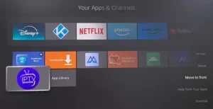 Fire TV interface showing IPTV Smarters Pro app icon among other apps with options menu open