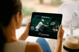 Woman watching Wimbledon tennis match live on tablet using IPTV Smarters app